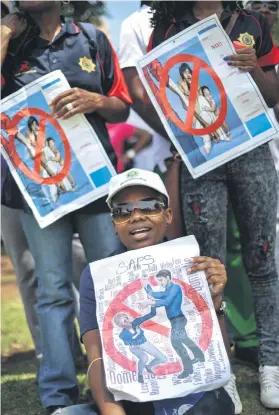  ?? Picture: Jacques Nelles ?? MAKING A STAND. Police officers hold placards after their march from the Union Buildings to Church Square yesterday as part of the Saps programme of action for 16 days of Activism for no Violence Against Women and Children.