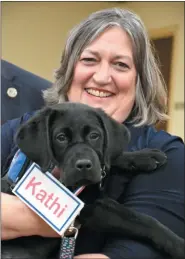  ?? SUBMITTED PHOTO-BECKY BRAIN ?? County Commission­er Kathi Cozzone gives her namesake a big hug.