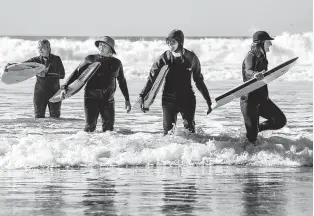  ?? TRIBUNE NEWS SERVICE ?? Members of the San Dieguito Newcomers Boogie Boarding Group — Ginny Van Meter, Loraine Vaught, Pam Shetler and Kim Lubesnick — recently meet in Solana Beach, California.