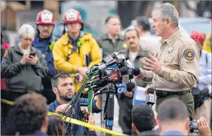  ?? AP PHOTO ?? Ventura County Sheriff Geoff Dean speaks to reporters near the scene in Thousand Oaks, Calif., on Thursday, where a gunman opened fire the previous night inside a country dance bar crowded with hundreds of people. Officials say the suspect is dead inside the bar.