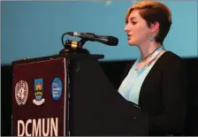  ??  ?? DCMUN Secretary General Hope Williams welcoming delegates during the opening ceremony.