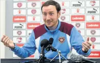  ??  ?? DOWNHILL FROM HERE Ian Cathro joked he will go skiing