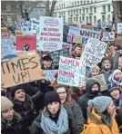  ?? WILL OLIVER/EPA-EFE ?? Protesters take part in a Time’s Up rally in Central London on Jan. 21.