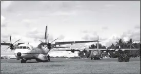  ?? EPA ?? Philippine Air Force military aircraft stand ready after landing on Pagasa island in the Spratlys during Defense Secretary Delfin Lorenzana’s visit yesterday.