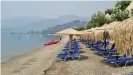  ??  ?? An empty beach on Evia after the fire: Most paying guests have left