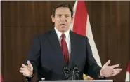  ?? ASSOCIATED PRESS FILE PHOTOS ?? Florida Gov. Ron DeSantis speaks at a news conference on Jan. 26, in Miami.