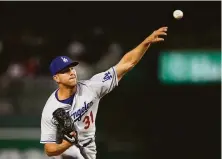  ?? Nick Wass / Associated Press ?? Dodgers starting pitcher Tyler Anderson retired the first 16 batters he faced and finished with eight shutout innings.