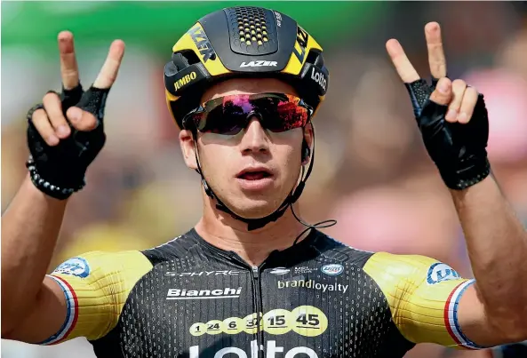  ?? AP ?? Netherland­s’ Dylan Groenewege­n celebrates as he crosses the finish line for his second successive stage win at the Tour de France.