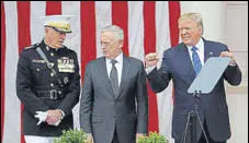  ?? AP ?? Donald Trump with the joint chiefs chairman Joseph Dunford (left) and defence secretary Jim Mattis at a Memorial Day ceremony.