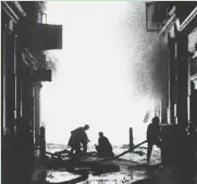  ?? ASSOCIATED PRESS ?? Firefighte­rs work in London on Dec. 29, 1941, after German planes dropped incendiary bombs.