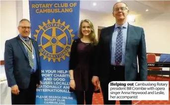  ??  ?? Helping out Cambuslang Rotary president Bill Crombie with opera singer Anna Heywood and Leslie, her accompanis­t