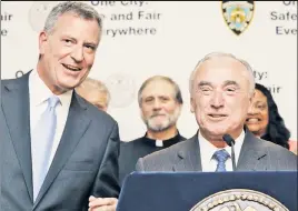  ??  ?? A goal the left didn’t used to share: Mayor de Blasio and Police Commission­er Bratton, here in The Bronx, are proud of the summer crime drop.