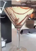  ?? VINO CAPPUCCINO ?? Vino Cappuccino’s tiramisu is layered in martini glasses.