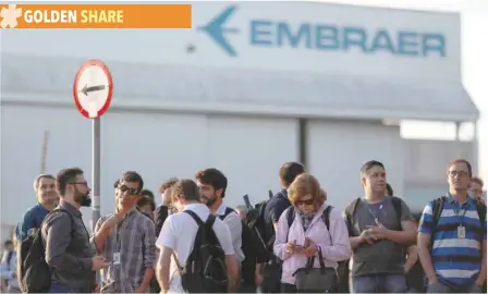  ?? — Reuters ?? Employees of Embraer are seen during a protest against the company sale to Boeing in Sao Jose dos Campos, Brazil.