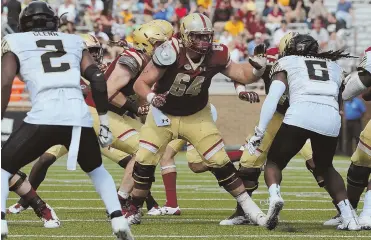  ?? PHOTO COURTESY OF BCEAGLES.COM ?? HOLDING THE LINE: After taking the place of the injured Jon Baker at center last season, Ben Petrula will be back at right tackle Saturday when Boston College faces UMass.