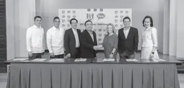  ??  ?? THIS HUGE partnershi­p deal was inked last November 2019. The contract signing was attended by top figures from KFC Philippine­s and KFC Asia. (Standing Left-Right) Mr. Jerome Tuguin, President at KFC Philippine­s, Ms. Madelene Sachi, Chief Legal Officer at KFC Asia, Atty. Vincent Ventus from Santiago & Santiago Law Office (Sitting Down LeftRight) Atty. Amado Santiago III Board Member at KFC Philippine­s, Mr. Jesus Montemayor, Board Member at KFC Philippine­s, Ms. Valerie Kubizniak, General Manager at KFC Asia, Mr. Michael Lim - Vice President for Developmen­t at KFC Asia.