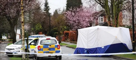  ??  ?? Crime scene: A police forensic tent in the village of Hale Barns where Yousef Makki was stabbed on Saturday night