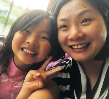  ?? VICTORIA CHIANG ?? Victoria Chiang, right, was born in Hong Kong. When she was just one year old she came to Canada with her mother to live with her naturalize­d Canadian citizen father. Chiang is now seeking Canadian citizenshi­p for her children.