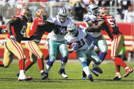  ?? Carlos Avila Gonzalez / The Chronicle ?? The 49ers’ defense struggled to contain Dallas running back Ezekiel Elliott, who finished with 147 rushing yards.