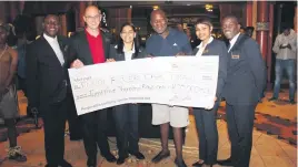  ?? Pictures: Supplied ?? CASH BONUS. The winner of R25 000 in the first Meropa Fundi Fever draw of the year was Mahohlo Mokhondo, centre, seen here with his cheque.