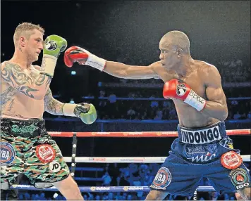  ?? Picture: GETTY IMAGES ?? WAIT OVER: WBA super-lightweigh­t world champion Ricky Burn takes on IBF-IBO super-lightweigh­t world champion Julius Indongo during the world super-lightweigh­t unificatio­n bout at The SSE Hydro in April this year in Glasgow, Scotland