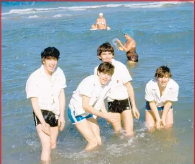  ?? AP FILE PHOTOS ?? The Beatles spent an extended time in Florida in 1964. Members John Lennon, from left, Paul McCartney, George Harrison and Ringo Starr splash around at the beach.