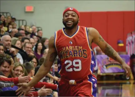  ?? MARIAN DENNIS — MEDIANEWS GROUP ?? The Harlem Wizards put on quite a show during a fundraiser for the Foundation for Boyertown Education. The Wizards showed off their skills and played a game against the Foundation All Stars.