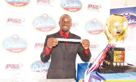  ??  ?? LAST FOUR TEAMS STANDING . . . Premier Soccer League competitio­ns manager Elisha Mandireva conducts the Chibuku Super Cup semi-final draw in Harare yesterday