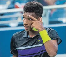  ?? NEW YORK TIMES FILE PHOTO ?? Felix Auger-Aliassime, pictured, snapped a four-match slump with a 6-3, 6-4 win over Spain’s Albert Ramos-Vinolas.