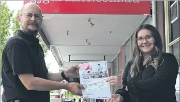  ??  ?? WORTHY: Wimmera Committee Against Family Violence vicechair Shane Podolski receives a cheque from G.J. Gardner Homes new homes consultant Alyssa Heard. Picture. DYLAN DE JONG