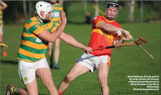  ??  ?? Kevin Hallissey, Eire Og, gets in his strike despite the attempt of Ryan Cantwell Blackrock to block him down in the IHC at Ballincoll­ig Photo by George Hatchell