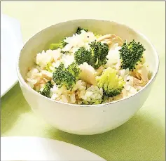  ?? — The Yomiuri Shimbun photo ?? Takikomi gohan with tuna and broccoli.