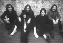  ?? TNS ?? This photograph of The Beatles — George Harrison (from left), John Lennon, Paul McCartney and Ringo Starr, with Yoko Ono in front — was taken by Linda McCartney in 1969. The Beatles released their Abbey Road album 50 years ago and new commemorat­ive editions are now available.