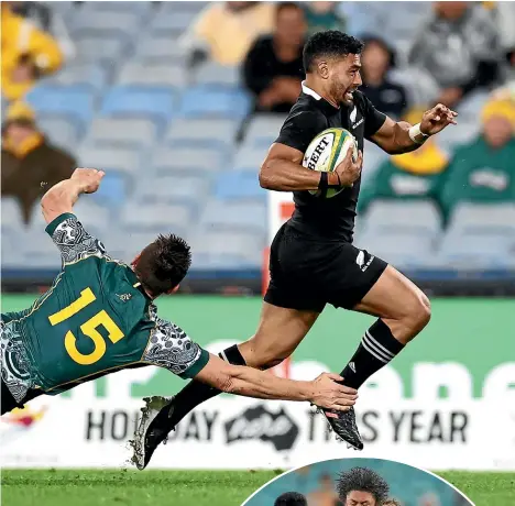  ?? GETTY IMAGES ?? Two-try All Blacks hero Richie Mo’unga sprints out of the clutches of Wallabies rival Dane Haylett-Petty while Caleb Clarke, right, takes on the defence last night.