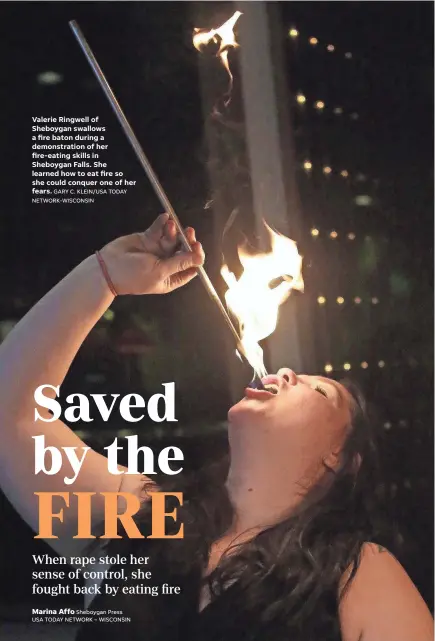  ?? GARY C. KLEIN/USA TODAY NETWORK-WISCONSIN ?? Valerie Ringwell of Sheboygan swallows a fire baton during a demonstrat­ion of her fire-eating skills in Sheboygan Falls. She learned how to eat fire so she could conquer one of her fears.