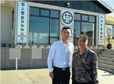  ?? Picture: EUGENE COETZEE ?? TALKING TURKEY: Jie Lee Zhang, CEO of the Nelson Mandela Bay Chinese Community and Police Co-operation Centre, with community liaison officer Nadia Jooste at the centre in Mangold Street, Newton Park