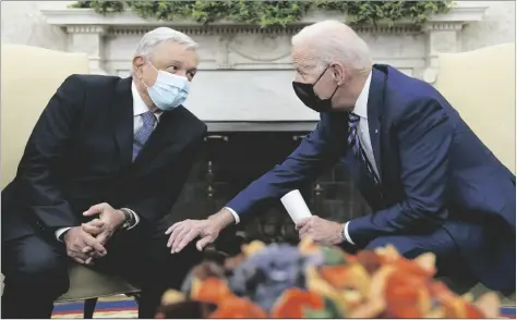  ?? AP PHOTO/SUSAN WALSH ?? President Joe Biden meets with Mexican President Andrés Manuel López Obrador in the Oval Office of the White House in Washington, in 2021.