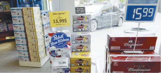  ?? - La Presse canadienne ?? Les Néo-Brunswicko­is n’ont pas le droit constituti­onnel de ramener à la maison comme bon leur semble l’alcool acheté dans les dépanneurs du Québec.