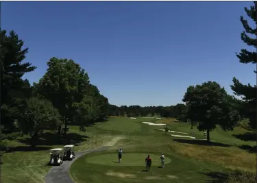  ?? MEDIANEWS GROUP ?? Golfers tee off on the 16th hole at Moselem Springs Golf Course in 2018. The course in Richmond Township has changed hands.