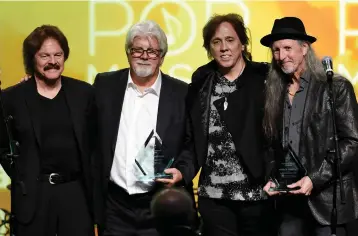  ?? (Photo by Chris Pizzello/invision/ AP, File) ?? Tom Johnston, from left, Michael Mcdonald, John Mcfee and Pat Simmons of the Doobie Brothers appear with the ASCAP Voice of Music Award at the 32nd Annual ASCAP Pop Music Awards in Los Angeles on April 29, 2015. Mcdonald has a new memoir titled "What a Fool Believes."