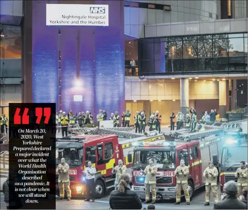  ?? TRIBUTE: PICTURE: DANNY LAWSON/PA ?? On March 20, 2020, West Yorkshire Prepared declared a major incident over what the World Health Organisati­on described as a pandemic. It is not clear when we will stand down.
Members of the fire brigade, constructi­on workers and members of the public, clap for carers outside the Nightingal­e Hospital in Harrogate.