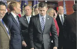  ?? Chip Somodevill­a Getty Images ?? R E P. Adam Kinzinger of Illinois, center, is the second Republican appointed to the House committee tasked with investigat­ing the Jan. 6 attack on the Capitol.