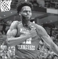  ?? AP/MORRY GASH ?? Middle Tennessee forward JaCorey Williams, who transferre­d from Arkansas, scored 13 points in the Blue Raiders’ 81-72 victory over Minnesota on Thursday in Milwaukee.