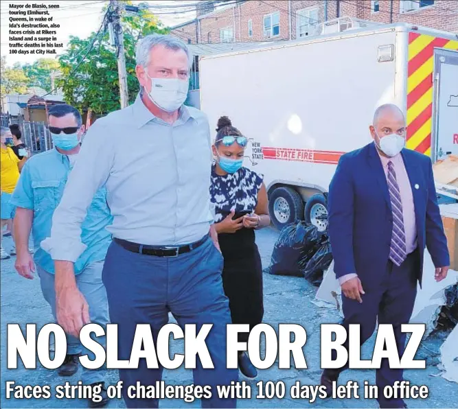  ??  ?? Mayor de Blasio, seen touring Elmhurst, Queens, in wake of Ida’s destructio­n, also faces crisis at Rikers Island and a surge in traffic deaths in his last 100 days at City Hall.