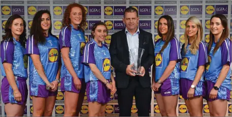  ??  ?? Cork manager Ephie Fitzgerald is pictured with members of Cork’s Division 1 Team of the League, from left, Martina O’Brien, Hannah Looney, Niamh Cotter, Melissa Duggan, Shauna Kelly, Orla Finn and Eimear Scally. Photo by Sportsfile