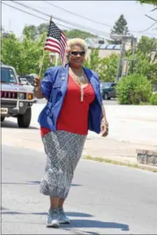  ?? DIGITAL FIRST MEDIA FILE PHOTO ?? State Rep. Margo Davidson marches in the Yeadon Flag Day parade.