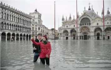  ?? — AFP ?? Mayor Luigi Brugnaro said Venice was ‘on its knees’.