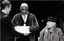  ?? AP PHOTO/RICHARD SHOTWELL ?? Joni Mitchell is presented with a birthday cake on stage at JONI 75: A Birthday Celebratio­n on Wednesday at the Dorothy Chandler Pavilion in Los Angeles.