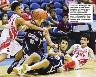  ??  ?? Adamson’s Nico Capote (18) and Harold Ng fight for the looseball with University of the East’s Bonbon Batiller (15) and Edgar Charcos during their UAAP basketball game yesterday at the Smart Araneta Coliseum. The Red Warriors won, 89-78. (Ernie U....