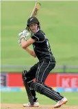  ??  ?? With baby Grace in safe hands, Amy Satterthwa­ite is eager to resume her internatio­nal cricket career.